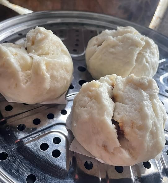 Freshly steamed pork bao buns at Hua Lien Chinese Take-Aways