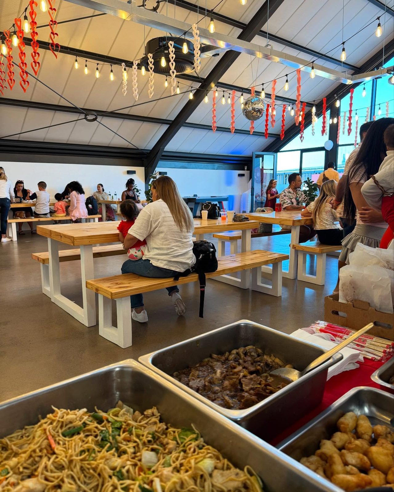 Catered event with buffet at a function venue by Hua Lien